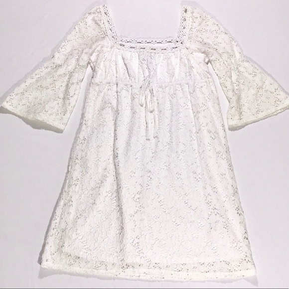 white eyelet dress with bell sleeves